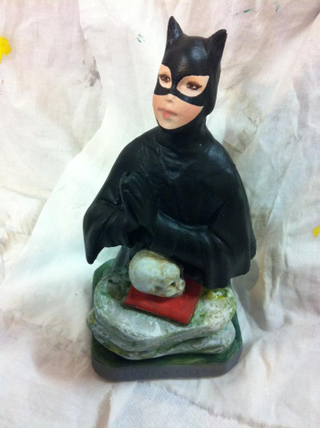 Illustration for article titled Saintly statues get superheroic makeovers